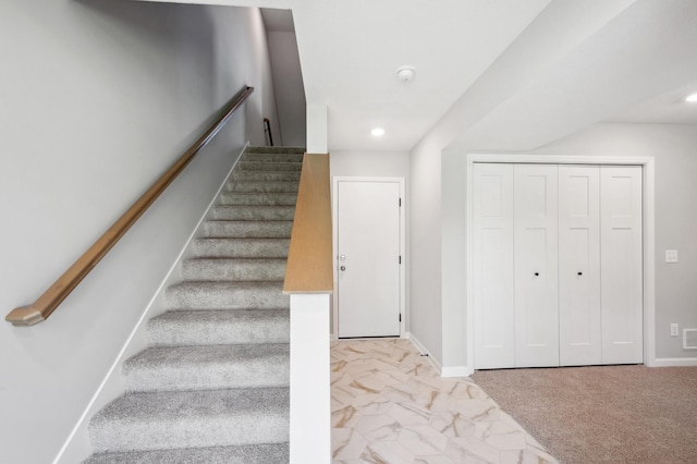 stairs with marble finish floor, recessed lighting, and baseboards