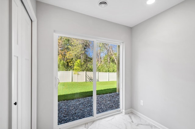 doorway to outside with marble finish floor, visible vents, and baseboards