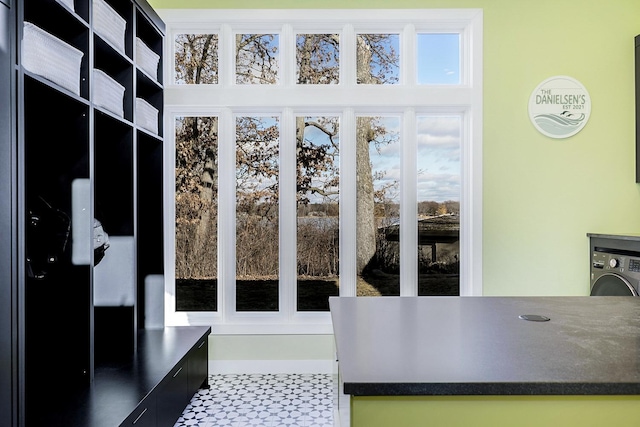 mudroom featuring washer / clothes dryer and tile patterned floors