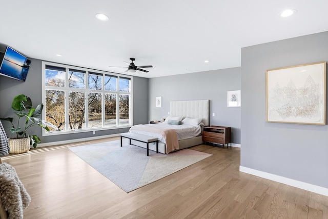 10 Shore Rd, North Oaks, MN 55127 - bedroom featuring wood finished floors, baseboards, recessed lighting, and a ceiling fan