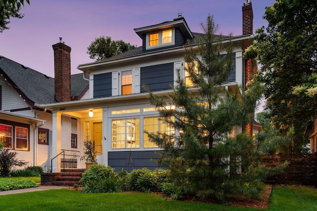 4943 Dupont Ave S, Minneapolis, MN 55419 - view of front of house with a chimney and a front lawn