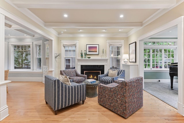 4943 Dupont Ave S, Minneapolis, MN 55419 - living room with a fireplace, light wood-style flooring, beam ceiling, crown molding, and recessed lighting