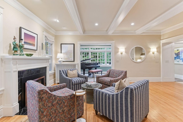 4943 Dupont Ave S, Minneapolis, MN 55419 - living area with beamed ceiling, light wood-style flooring, a premium fireplace, crown molding, and recessed lighting