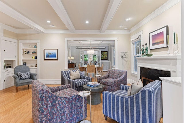 4943 Dupont Ave S, Minneapolis, MN 55419 - living area with light wood finished floors, beam ceiling, a premium fireplace, crown molding, and recessed lighting