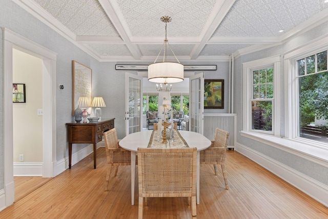 4943 Dupont Ave S, Minneapolis, MN 55419 - dining room with healthy amount of natural light, light wood-type flooring, french doors, coffered ceiling, and beamed ceiling