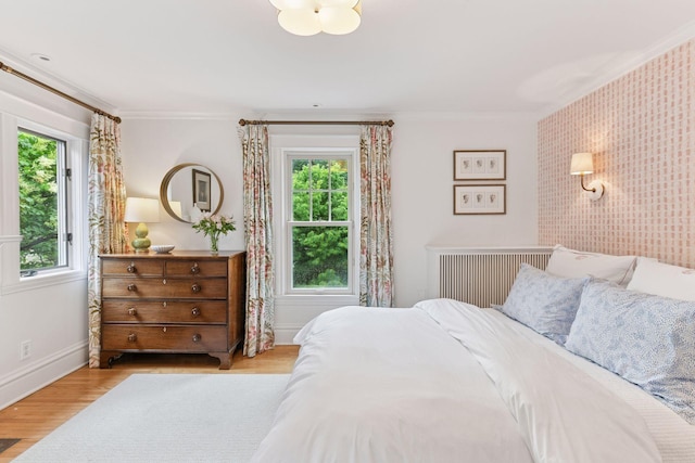 4943 Dupont Ave S, Minneapolis, MN 55419 - bedroom featuring ornamental molding and wood finished floors
