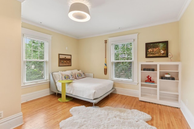 4943 Dupont Ave S, Minneapolis, MN 55419 - bedroom featuring wood finished floors, crown molding, and multiple windows