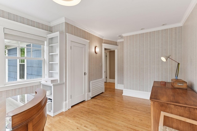 4943 Dupont Ave S, Minneapolis, MN 55419 - hallway with wallpapered walls, light wood-style floors, and ornamental molding