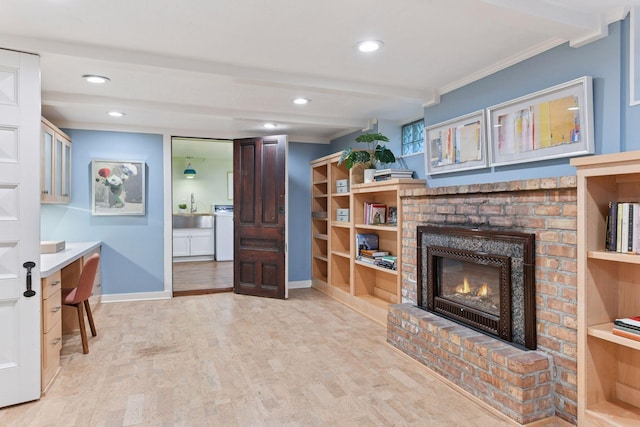 4943 Dupont Ave S, Minneapolis, MN 55419 - living area with a brick fireplace, recessed lighting, crown molding, and light wood-style flooring