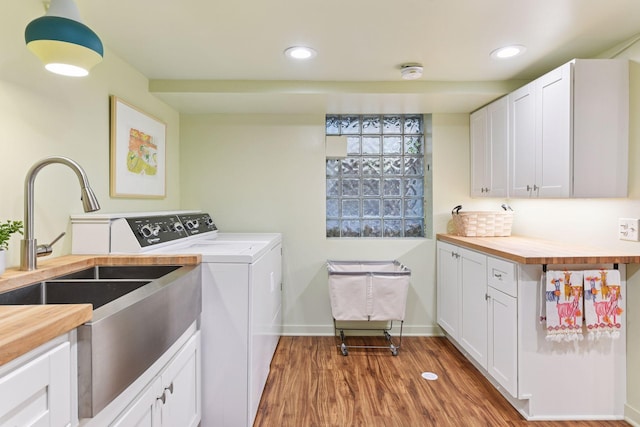 4943 Dupont Ave S, Minneapolis, MN 55419 - laundry room featuring cabinet space, washer and clothes dryer, wood finished floors, and recessed lighting
