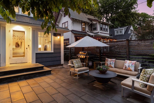 4943 Dupont Ave S, Minneapolis, MN 55419 - patio terrace at dusk with grilling area, a patio area, and an outdoor hangout area
