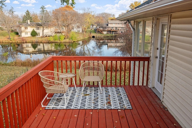 wooden terrace with a water view