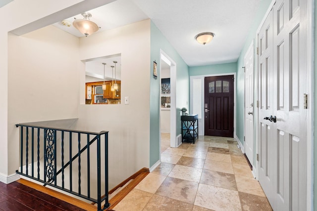 foyer with baseboards