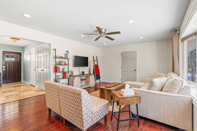 living area with recessed lighting, ceiling fan, baseboards, and wood finished floors