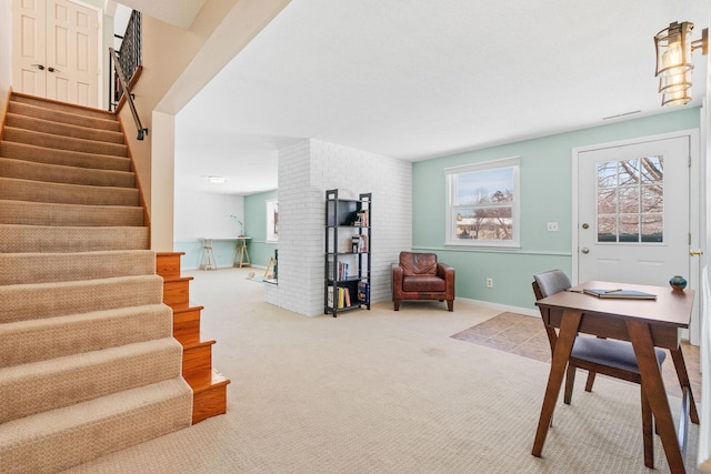 office with visible vents, carpet floors, and baseboards