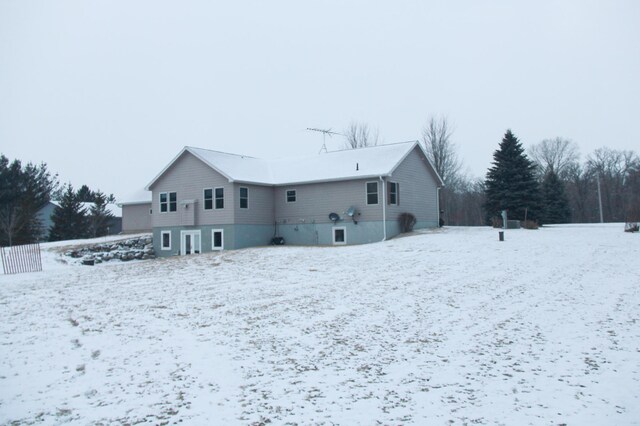 view of snow covered house