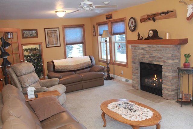 living room with baseboards, a fireplace, visible vents, and light colored carpet