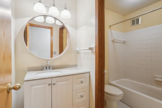 bathroom with vanity, visible vents, toilet, shower / bathing tub combination, and tile patterned floors