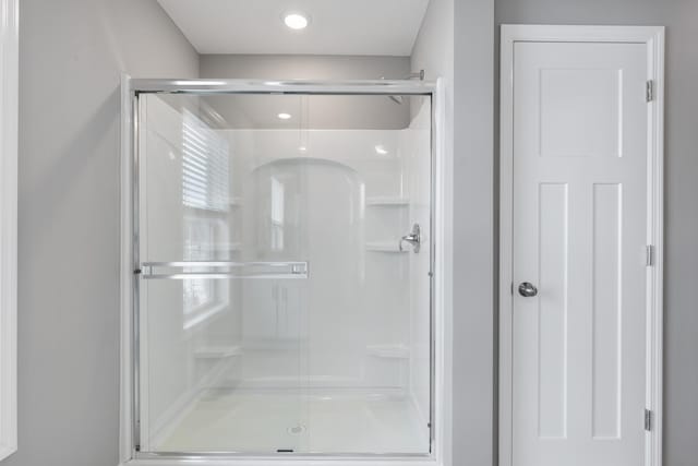 bathroom with a stall shower