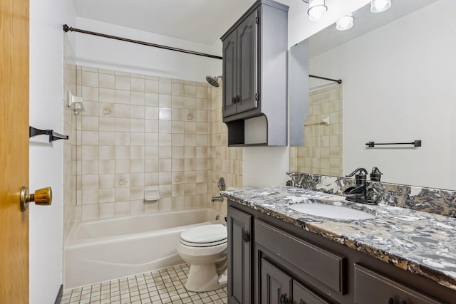 full bathroom featuring tile patterned flooring, vanity, toilet, and bathtub / shower combination