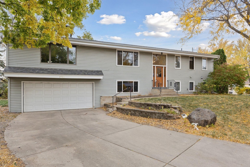 bi-level home featuring a garage