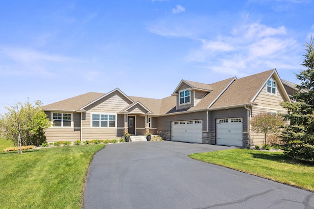 4680 Spruce Way, Medina, MN 55359 - view of front of house featuring driveway, a garage, a front yard, stone siding, and roof with shingles