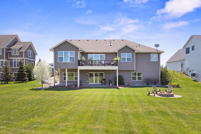 4680 Spruce Way, Medina, MN 55359 - rear view of property featuring a fire pit, a yard, and a wooden deck
