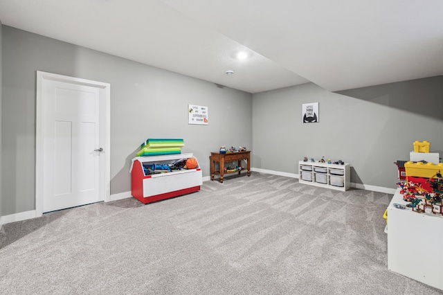 game room with carpet flooring and baseboards