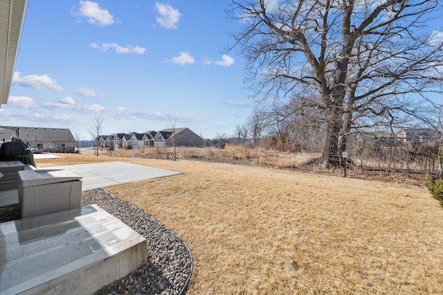 view of yard featuring a residential view