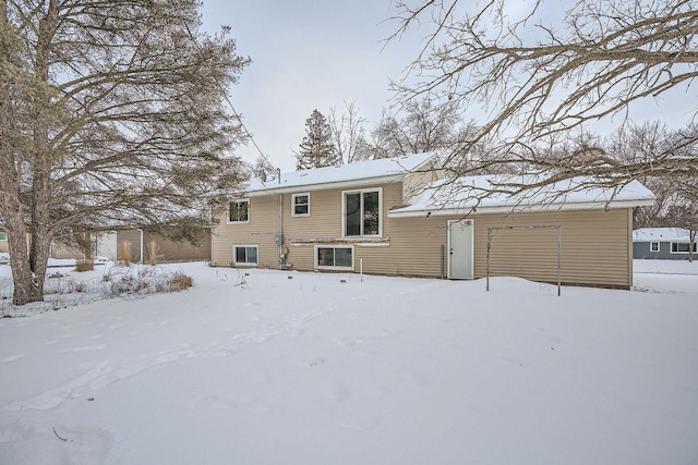 view of snow covered property