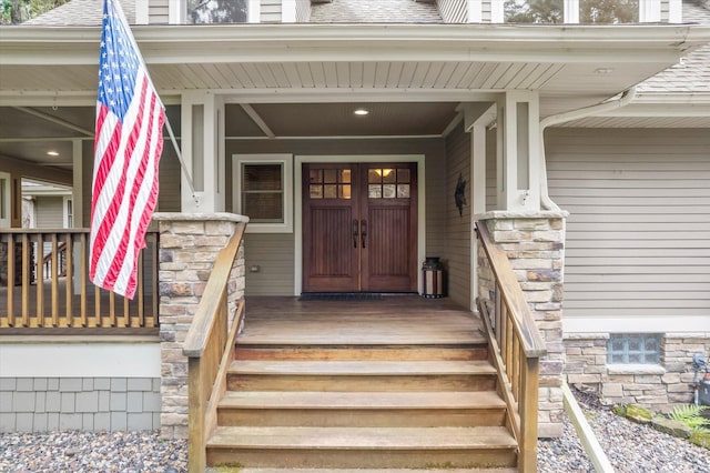 6388 Jasmine Ave N, Stillwater, MN 55082 - view of exterior entry featuring a porch and a shingled roof
