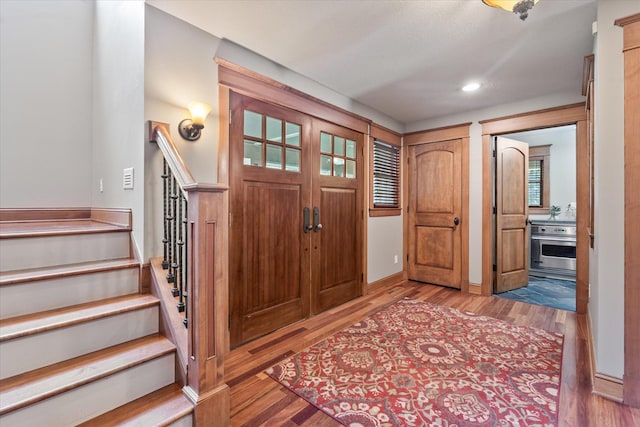 6388 Jasmine Ave N, Stillwater, MN 55082 - entryway with stairs, wood finished floors, and recessed lighting