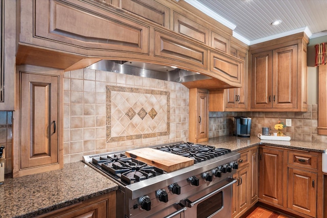 6388 Jasmine Ave N, Stillwater, MN 55082 - kitchen featuring range with two ovens, backsplash, stone countertops, and ornamental molding