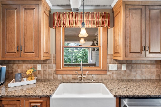 6388 Jasmine Ave N, Stillwater, MN 55082 - kitchen featuring tasteful backsplash, crown molding, dishwasher, light stone countertops, and brown cabinets