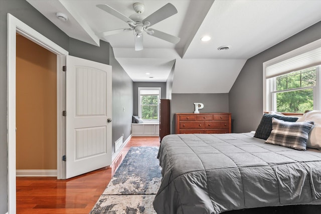 6388 Jasmine Ave N, Stillwater, MN 55082 - bedroom featuring wood finished floors, lofted ceiling, ceiling fan, and recessed lighting