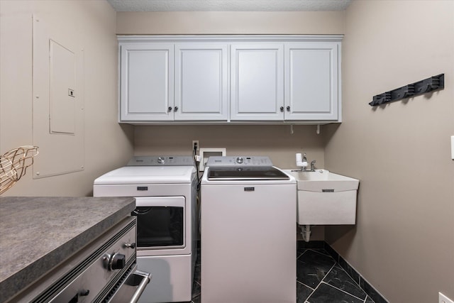 6388 Jasmine Ave N, Stillwater, MN 55082 - washroom with separate washer and dryer, cabinet space, marble look tiles, and electric panel