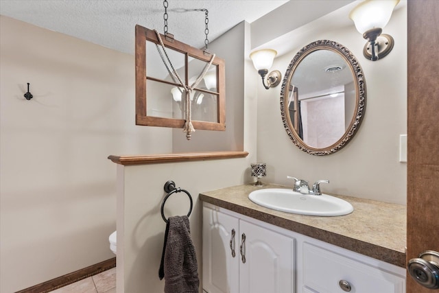 6388 Jasmine Ave N, Stillwater, MN 55082 - bathroom with vanity, a textured ceiling, and tile patterned flooring