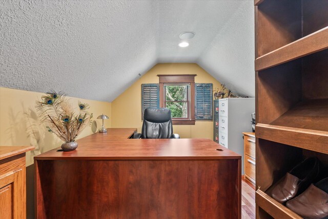 6388 Jasmine Ave N, Stillwater, MN 55082 - office area with a textured ceiling, lofted ceiling, and wood finished floors