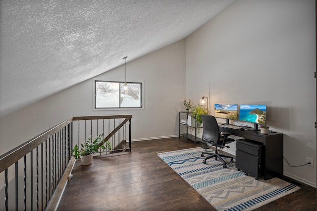 office area with lofted ceiling, dark wood-style floors, baseboards, and a textured ceiling