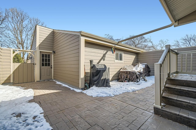 exterior space featuring a gate