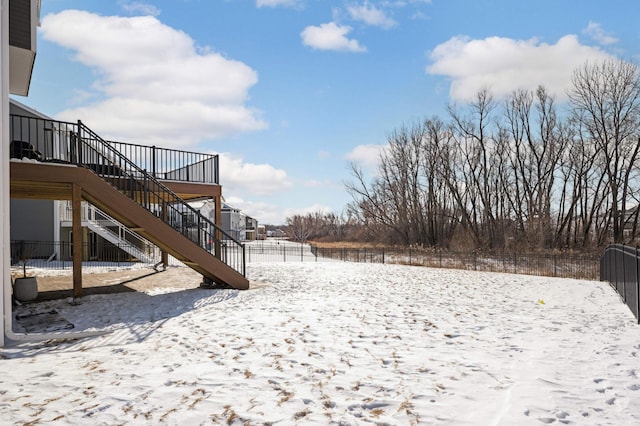 view of yard covered in snow