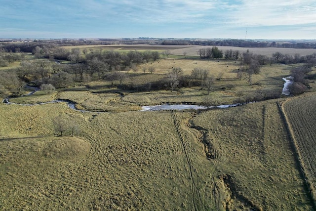 birds eye view of property featuring a rural view