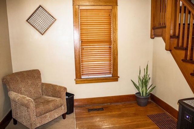 sitting room featuring hardwood / wood-style flooring