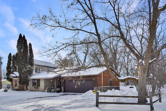 view of front of property featuring a garage