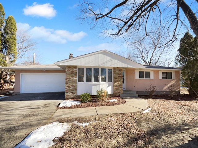 ranch-style house with a garage