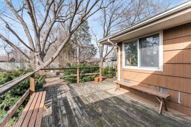 wooden deck featuring fence