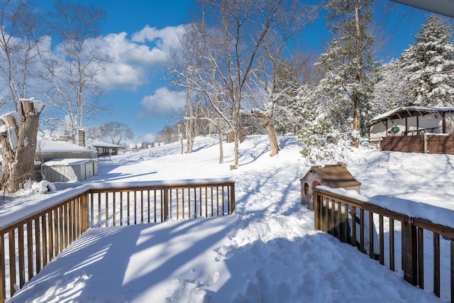 view of snow covered deck