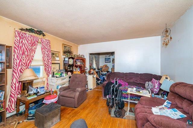 living room with hardwood / wood-style flooring