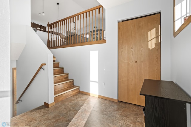 entrance foyer featuring baseboards