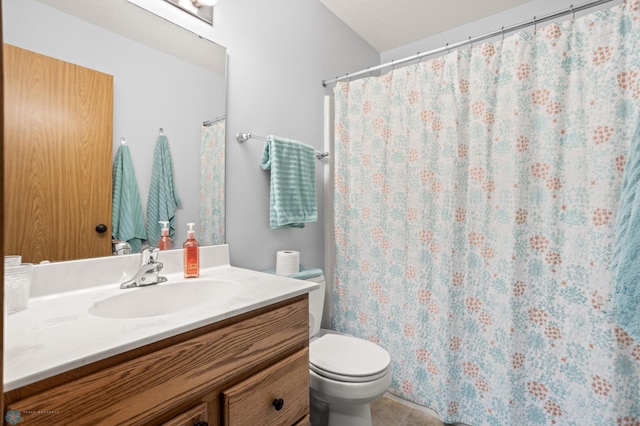 full bath with a shower with shower curtain, toilet, tile patterned flooring, a textured ceiling, and vanity